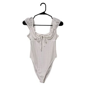 White bodysuit. 
Wild fable. Xs.